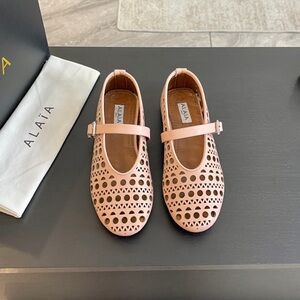 Alaia Pink Perforated Mary Jane Flats